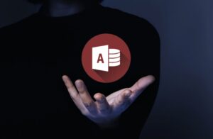 Hand with MS access icon on top
